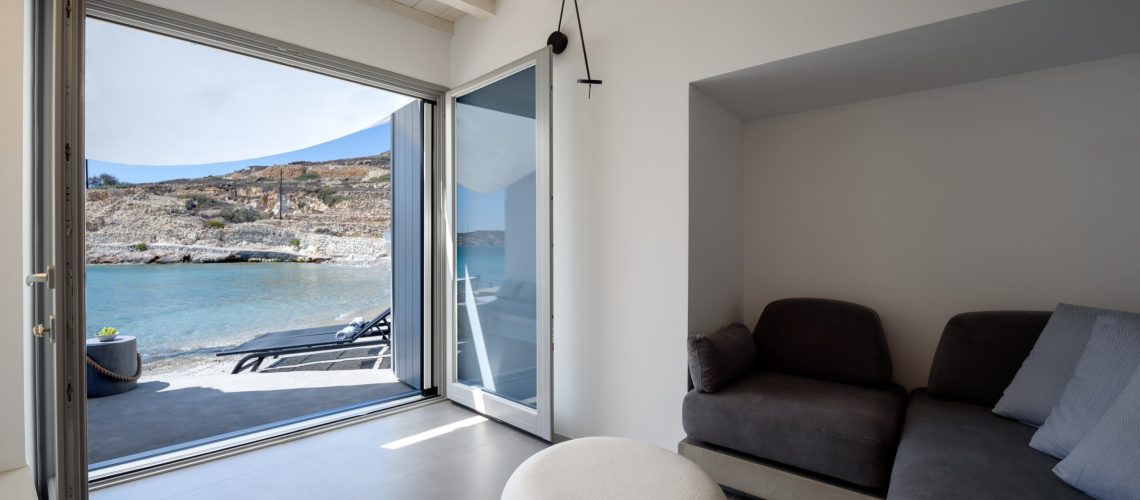 Κimolos Cave Residence on Agios Nikolaos beach in Cyclades Greece